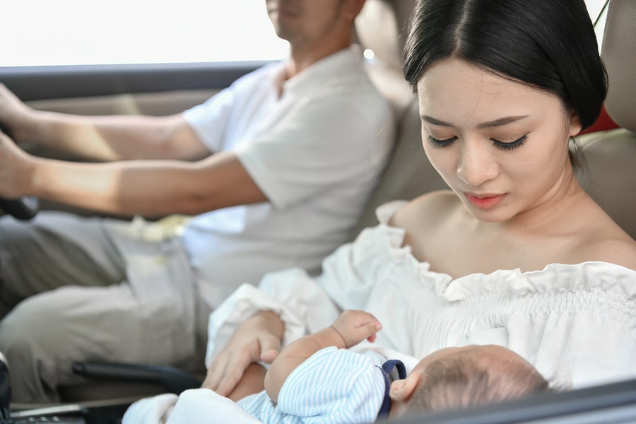 family with baby road trip